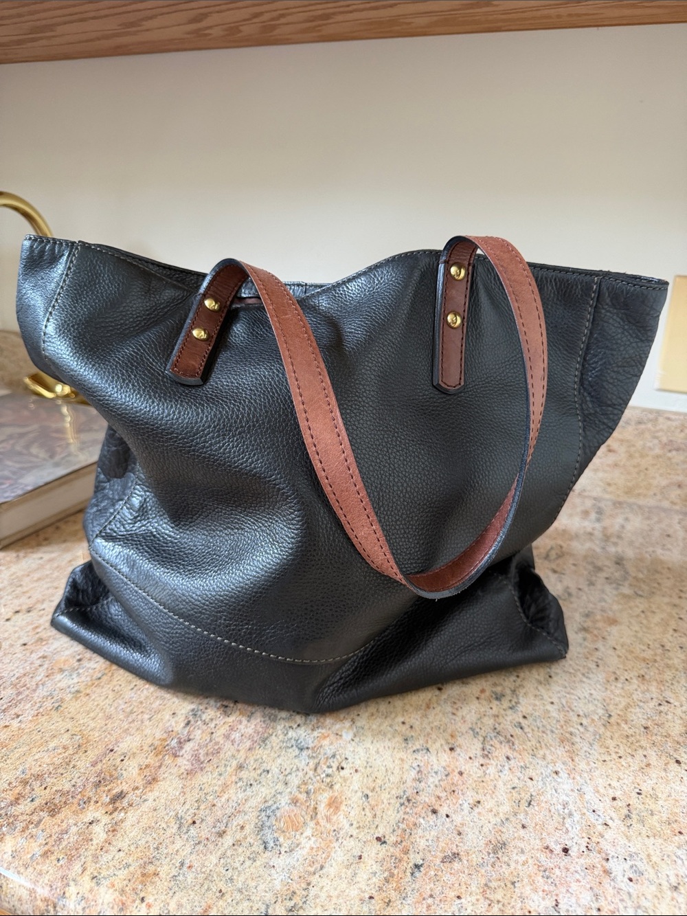 Fossil Black Pebbled Leather Tote with Brown Handles